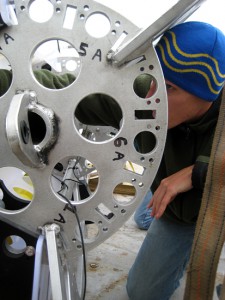 WHOI graduate studant Dave Sutherland loads a float into a SALP rosette. (Photo by Donovan Hohn, Woods Hole Oceanographic Institution)