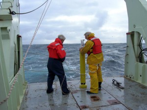 Will Ostrom and Jim Valdes prepare to launch the last profiling float into an eddy. (Photo by Alison Heater, Woods Hole Oceanographic Institution)
